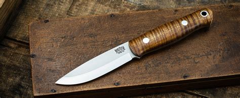 Two of these inches are sharpened, with a drop point design sloping down from its. . Bark river bushcraft knife